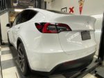 Tesla Model Y driver's side rear angle with ceramic coating