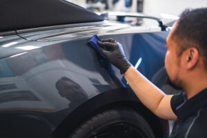Liberty Autoworx installing Gyeon Ceramic Coating on a car